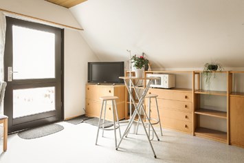 Monteurzimmer: Eingang in der Wohnküche - Ferienwohnung Klenk 2