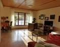 Monteurzimmer: großer Wohnbereich mit Schlafsofa (ausziehbar) - Kleine Gartenwohnung