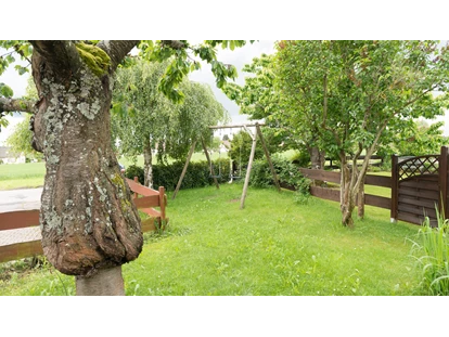 Monteurwohnung - Waschmaschine - Deutschland - Blick in den Garten - Haus Feldblick Neubulach