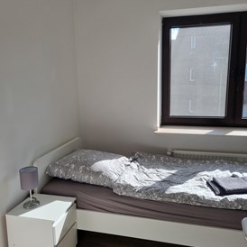 Monteurzimmer: Schlafzimmer - Monteurswohnung TAKAppartement Dormagen OG