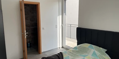 Monteurwohnung - Kleinostheim - Bett in der Monteurunterkunft in Hainburg - SA Hotel Monteurzimmer