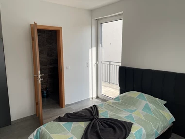 Monteurzimmer: Bett in der Monteurunterkunft in Hainburg - SA Hotel Monteurzimmer