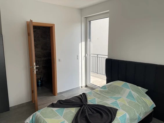 Monteurzimmer: Bett in der Monteurunterkunft in Hainburg - SA Hotel Monteurzimmer