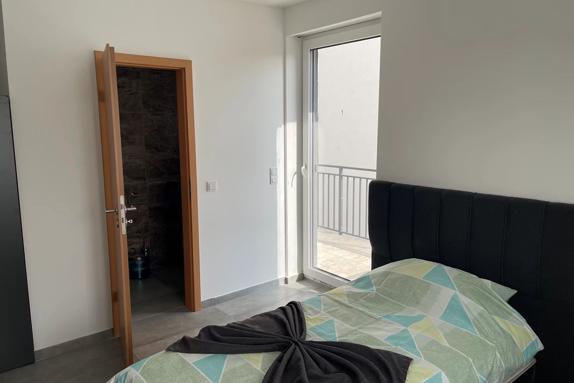 Monteurzimmer: Bett in der Monteurunterkunft in Hainburg - SA Hotel Monteurzimmer