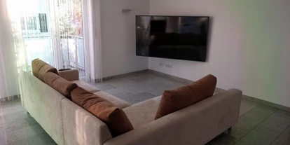 Monteurwohnung - Bad Teinach-Zavelstein - Wohnzimmer mit SmartTV - Boardinghouse/Gästezimmer