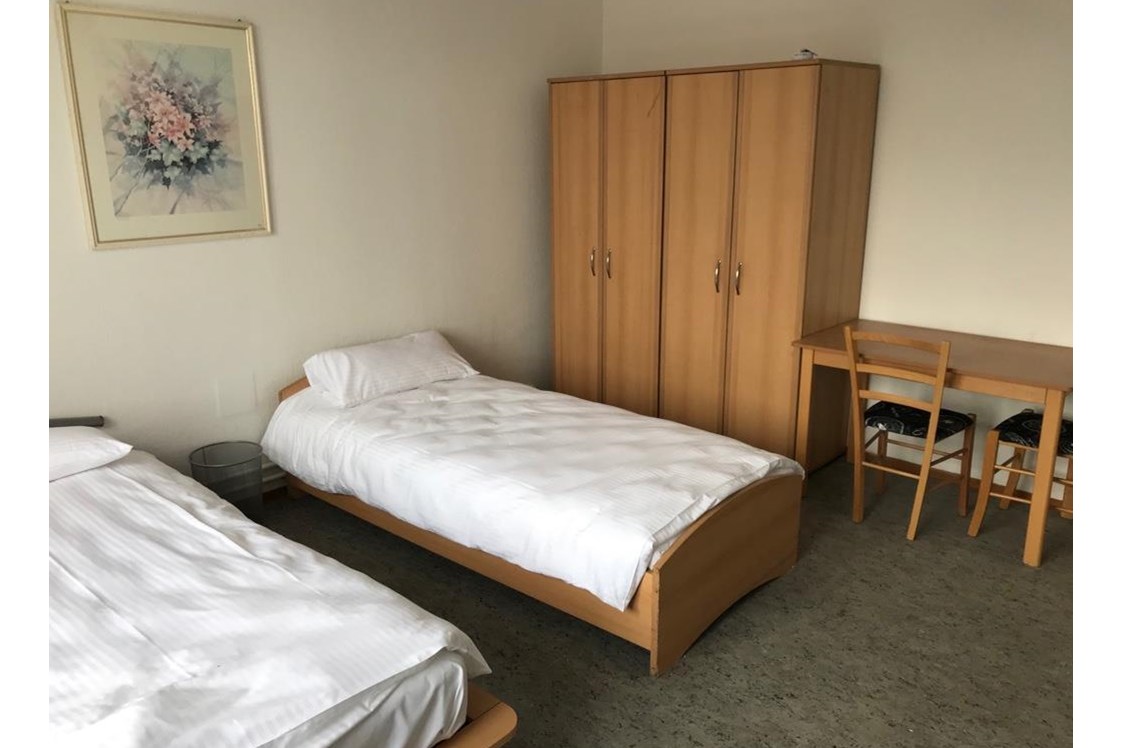 Monteurzimmer: Einzelbetten der Monteurunterkunft in Hannover - Pension Dreilinden