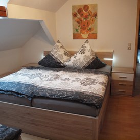Monteurzimmer: Schlafzimmer - Ferienwohnung Rennsteigoase Rosenthal