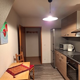 Monteurzimmer: Vollständig eingerichtete Küche mit Backofen Mikrowelle etc  - Haus Andries
