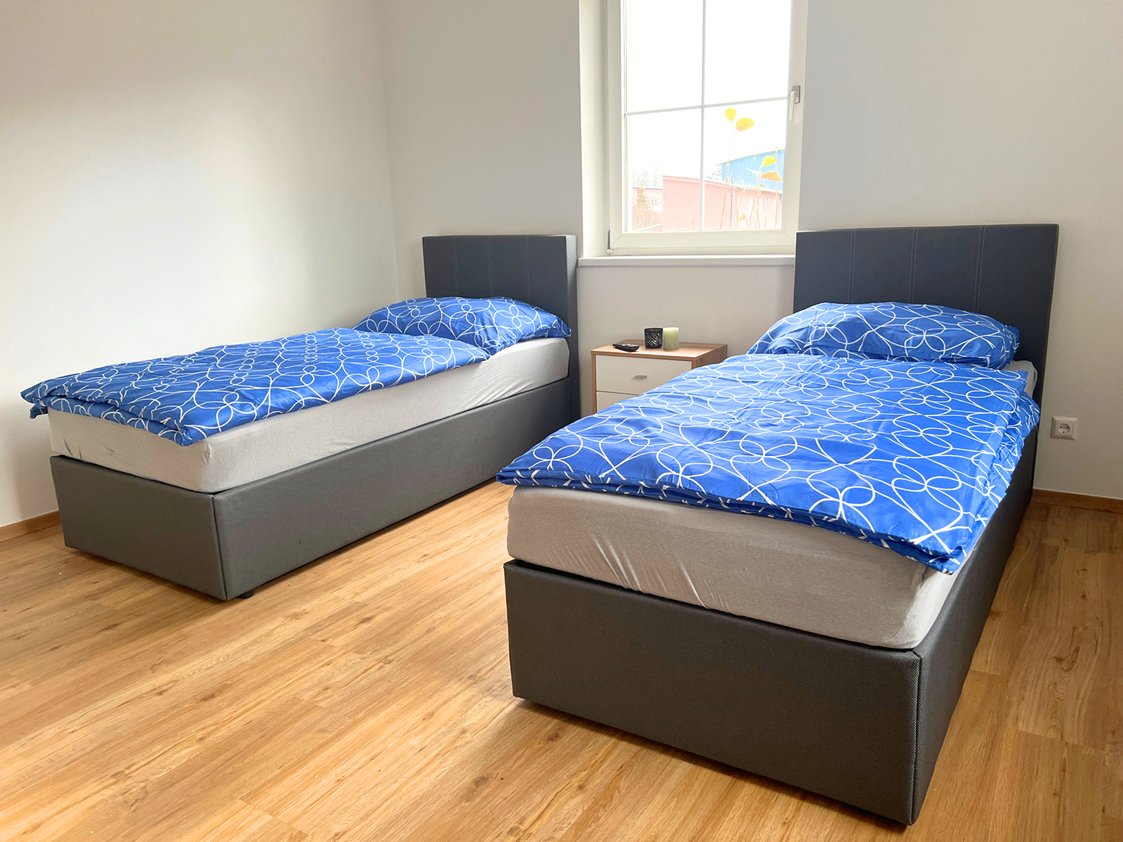 Monteurzimmer: Einzelbetten - Wochenzimmer - Premium Apartments für Monteure und Projektteams