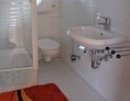 Monteurzimmer: Dusche, WC und Waschbecken - Gästehaus Pirrwitz