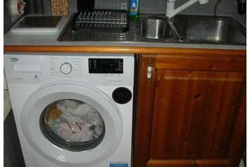 Monteurzimmer: Abwaschtisch und Waschmaschine,
Ferienwohnung im Familienhaus - Gästehaus Pirrwitz