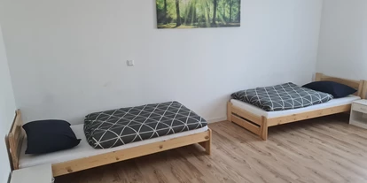Monteurwohnung - Muggensturm Gaggenau - Monteurzimmer Apartment am Bahnsteig
