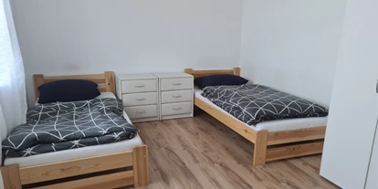 Monteurwohnung - Muggensturm Gaggenau - Monteurzimmer Apartment am Bahnsteig