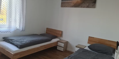 Monteurwohnung - Muggensturm Gaggenau - Monteurzimmer Apartment am Bahnsteig