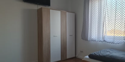 Monteurwohnung - Muggensturm Gaggenau - Monteurzimmer Apartment am Bahnsteig