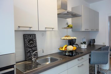 Monteurzimmer: Küche mit Sitzgelegenheiten - Ferienwohnung 110 qm, Monteurzimmer Uslar im Solling Niedersachsen