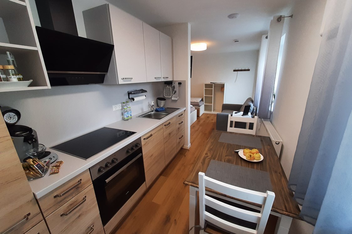 Monteurzimmer: Wohnung 2 Küche mit Eßbereich - Gästehaus Buberl