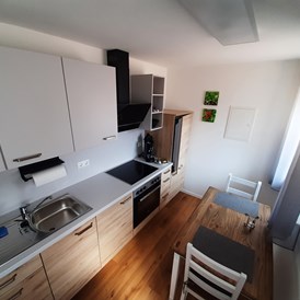 Monteurzimmer: Küche und Eßbereich Wohnung 3 - Gästehaus Buberl