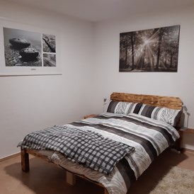 Monteurzimmer: Schlafzimmer Nr1 mit Doppelbett - Fewozie