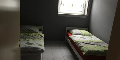 Monteurwohnung - PLZ 64289 (Deutschland) - Schlafzimmer 1 - Miller & Ihrig Immobilien