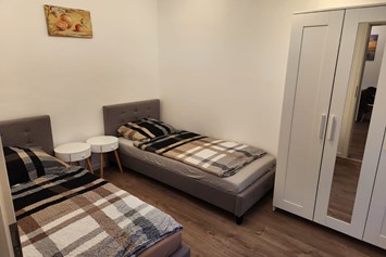 Monteurzimmer: Schlafzimmer - auszeit appartements & rooms