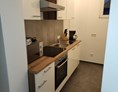 Monteurzimmer: Vollausgestattete Küche - auszeit appartements & rooms