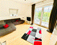 Monteurzimmer: Wohnzimmer Apartment - Apartment/Zimmer Haus Dragl bei Augsburg