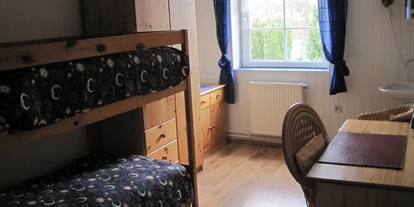 Monteurwohnung - Kaffeemaschine - Schleswig-Holstein - Kinderzimmer mit Etagenbett.Aber die Betten sind 190cm lang , es können dort also auch zwei Erwachsene schlafen - Ferienhof March