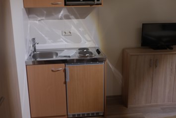 Monteurzimmer: Jedes Zimmer mit einer Pantryküche - Boardinghaus Modern Living