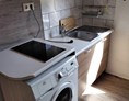 Monteurzimmer: Küche mit Waschmaschine - Dachsloch