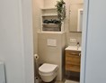 Monteurzimmer: WC mit barrierefreier Dusche und Waschmaschine - Wohnung Innsbruck Nähe Uni