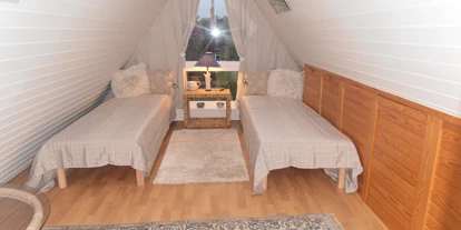 Monteurwohnung - Hund erlaubt - Schleswig-Holstein - Schlafzimmer oben - Ferienhaus Muschel