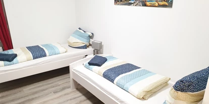 Monteurwohnung - Badezimmer: eigenes Bad - Münsterland - Schlafzimmer, HomeRent Unterkunft in Bedburg-Hau - HomeRent in Bedburg-Hau bei Kleve