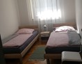 Monteurzimmer: Kleines Schlafzimmer - Ferienwohnung Am Tobelbach