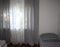 Monteurzimmer: Schlafzimmer mit Einzelbetten in den Apartments - Refugium