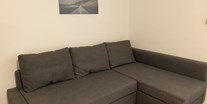 Monteurwohnung - Art der Unterkunft: Ferienwohnung - Sofa - Monteurwohnungen bei Wien