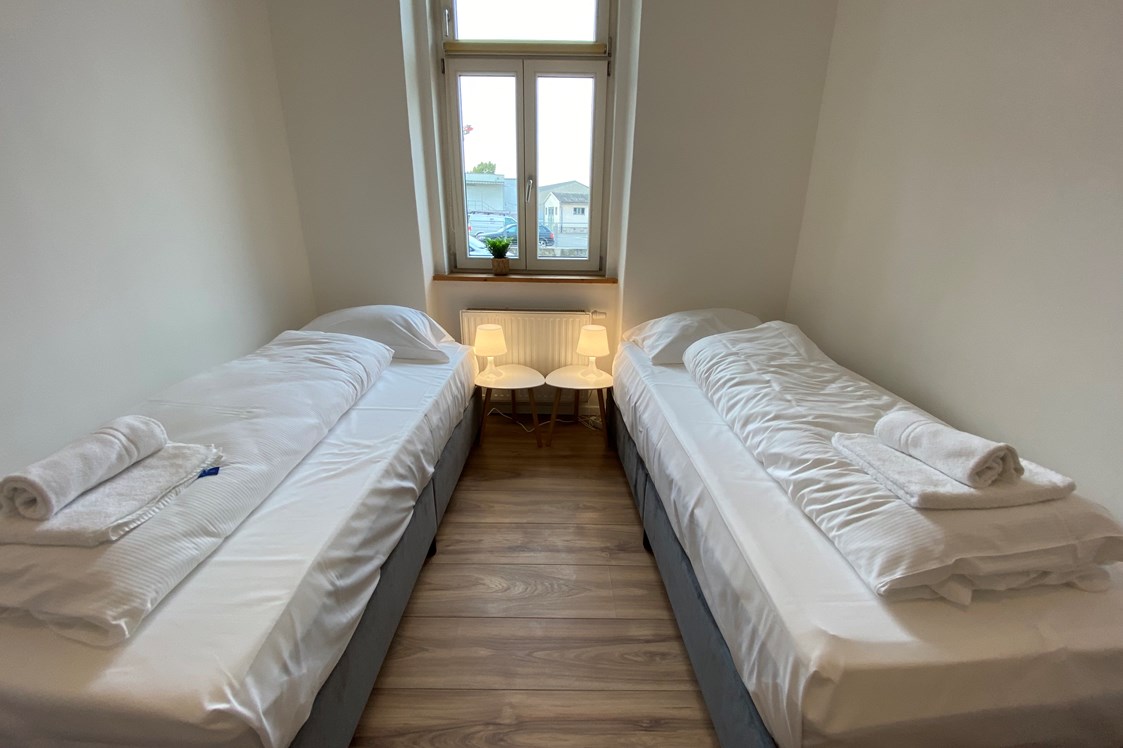 Monteurwohnung: Schlafzimmer inkl. Handtücher und Bettwäsche - Monteurwohnungen bei Wien