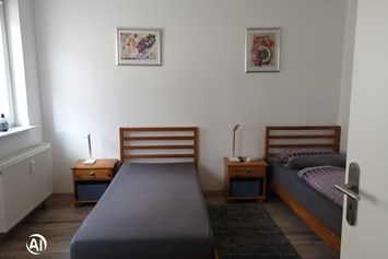 Monteurzimmer: Schlafzimmer 1 - Ferienwohnung Izzo Hockenheim 