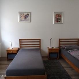 Monteurzimmer: Schlafzimmer 1 - Ferienwohnung Izzo Hockenheim 
