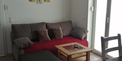 Monteurwohnung - Kronau Walldorf Bretten Kraichtal - Ess- und Wohnbereich  - Ferienwohnung Izzo Hockenheim