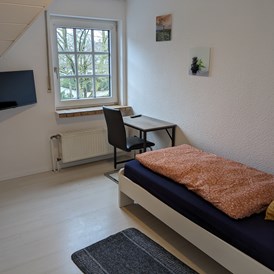 Monteurzimmer: Einzelzimmer Obergeschoss  - Monteurunterkunft Lingen-Brögbern 