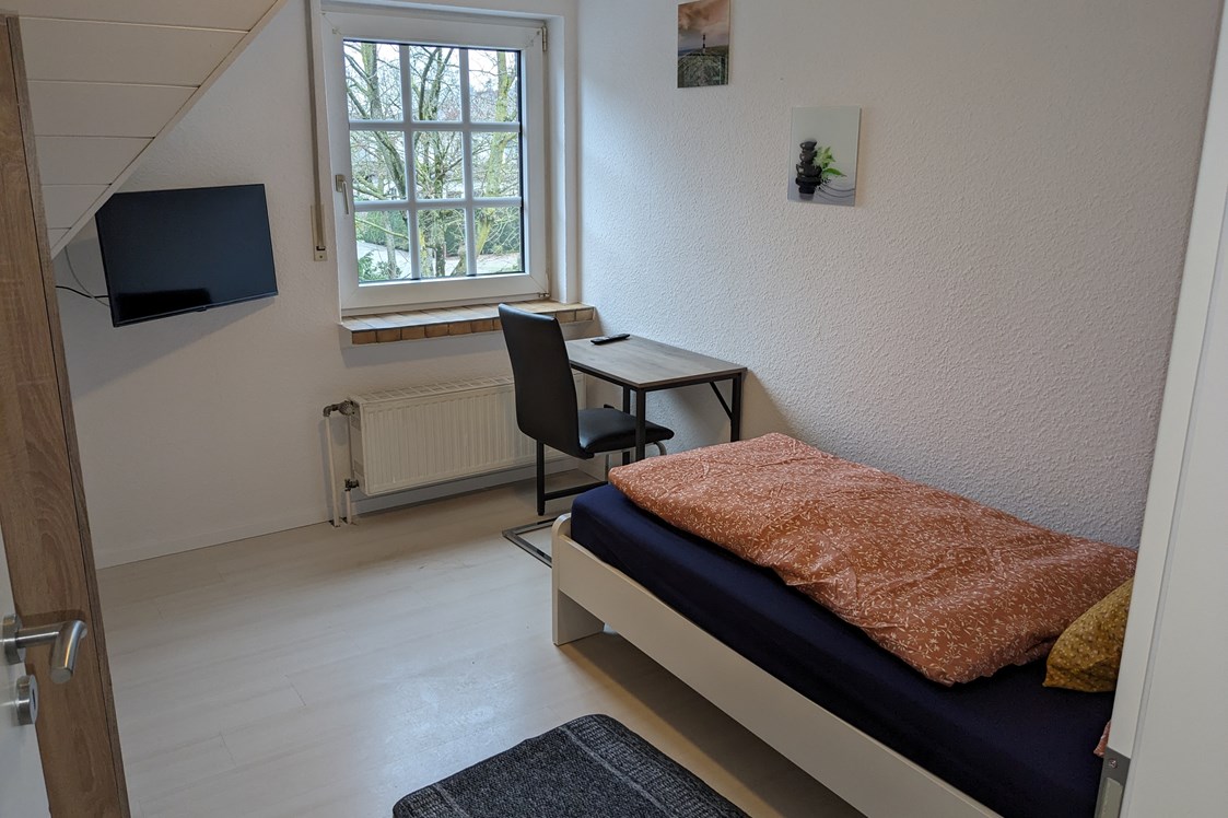 Monteurzimmer: Einzelzimmer Obergeschoss  - Monteurunterkunft Lingen-Brögbern 
