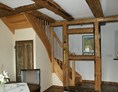 Monteurzimmer: Treppe zum Schlafbereich - Ferienwohnung Bauernhaus