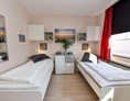 Monteurzimmer: 2 Einzelbetten (90/200) in Komforthöhe  - DiekleineEmma 
