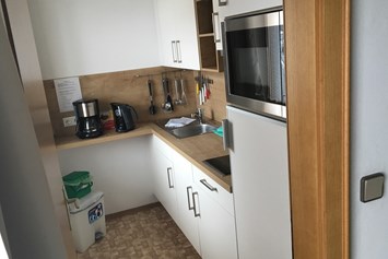 Monteurzimmer: Küche Studio  - Alpenhof Wildschönau Apartment Zimmer 