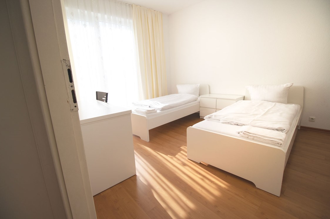 Monteurzimmer: Schlafzimmer, HomeRent Unterkunft in Bergisch Gladbach - HomeRent in Bergisch Gladbach