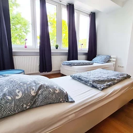 Monteurzimmer: Schlafzimmer, HomeRent Unterkunft in Langenfeld - HomeRent in Langenfeld