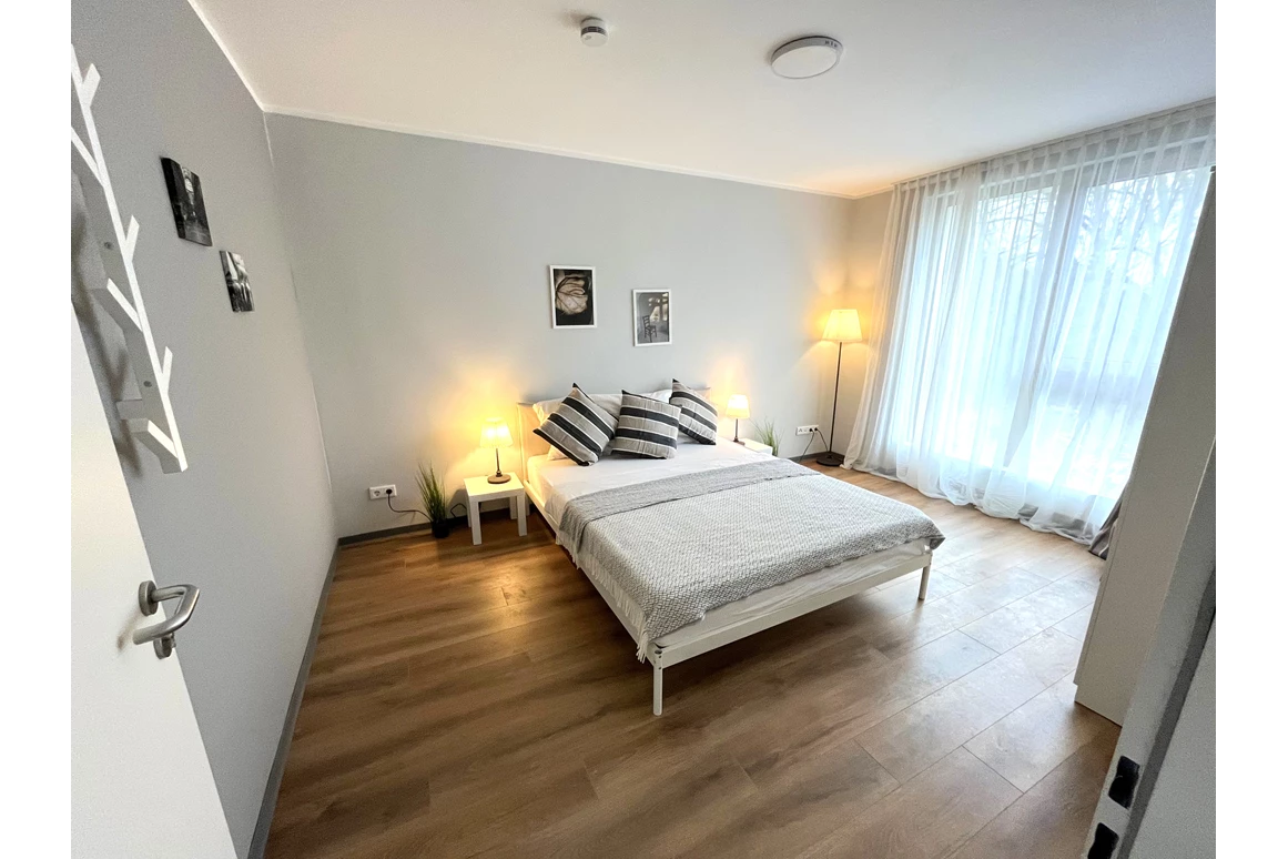 Monteurzimmer: Schlafzimmer 1 - Stilvolle Apartments am Park-Schönfeld