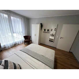 Monteurzimmer: Schlafzimmer 1 - Stilvolle Apartments am Park-Schönfeld