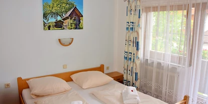Monteurwohnung - Balkon - Österreich - Geräumige Wohnung für 4 - 6 Personen! 45 m" Apartment Rosskopf - großes Wohnzimmer - Astoria Apartments Wildschoenau